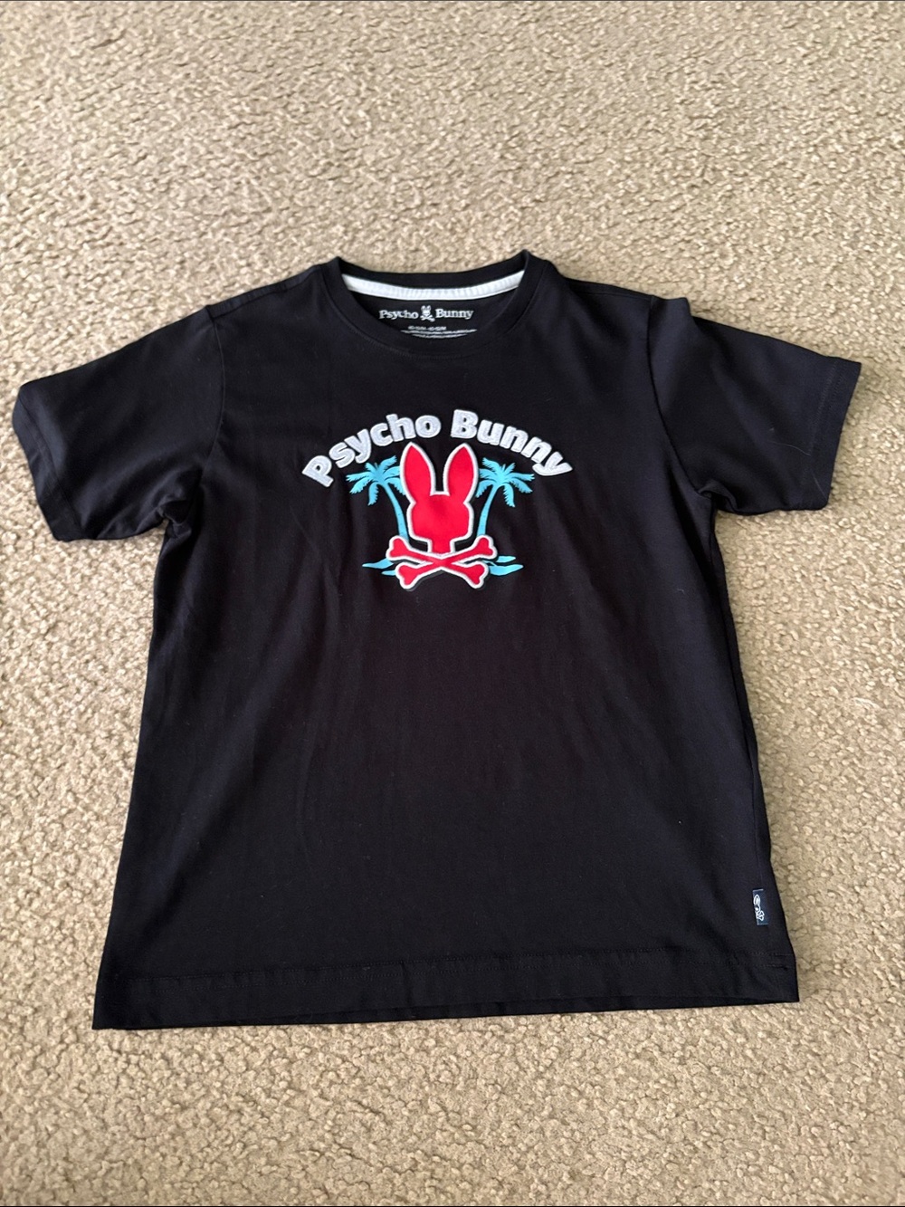 Psycho Bunny Black Tee with Red Bunny Logo and Teal Accents